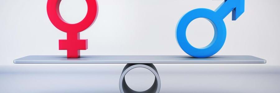 Fotolia_115047972_XL Foto einer ausgeglichene Waage - links ist das Symbol für weiblich in rot - rechts ist das Symbol für männlichin blau